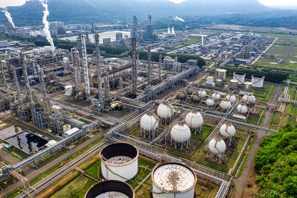 Petrochemical plant at night with process towers